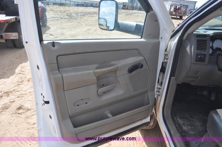 image for item F2352 2007 Dodge Ram 3500 Quad Cab flatbed truck