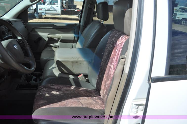 image for item F2352 2007 Dodge Ram 3500 Quad Cab flatbed truck