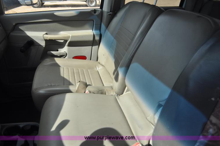 image for item F2352 2007 Dodge Ram 3500 Quad Cab flatbed truck