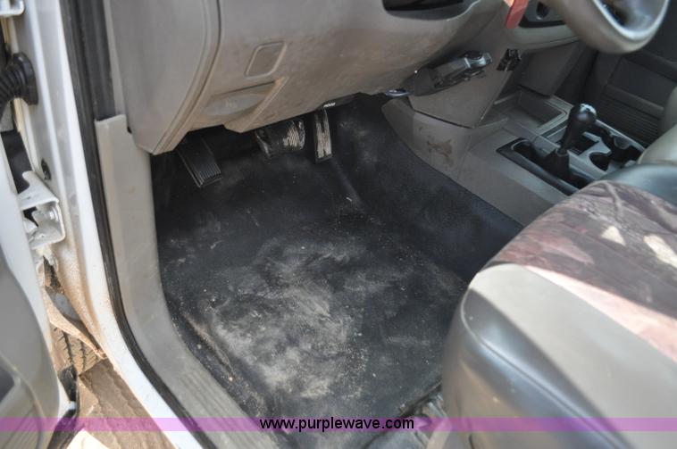 image for item F2352 2007 Dodge Ram 3500 Quad Cab flatbed truck