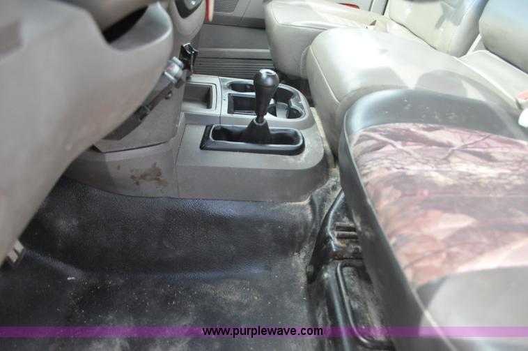 image for item F2352 2007 Dodge Ram 3500 Quad Cab flatbed truck