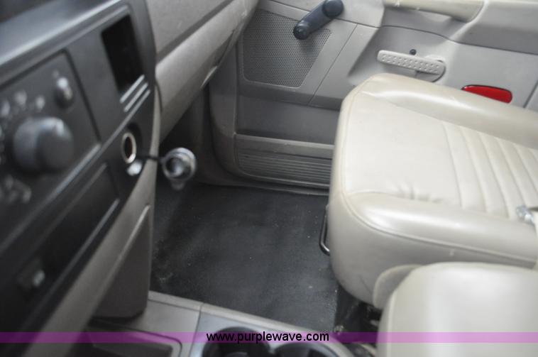 image for item F2352 2007 Dodge Ram 3500 Quad Cab flatbed truck