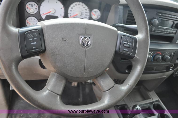 image for item F2352 2007 Dodge Ram 3500 Quad Cab flatbed truck