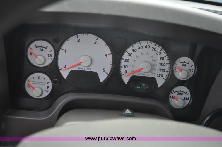 image for item F2352 2007 Dodge Ram 3500 Quad Cab flatbed truck