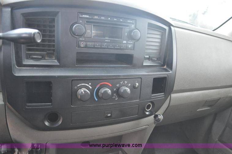 image for item F2352 2007 Dodge Ram 3500 Quad Cab flatbed truck