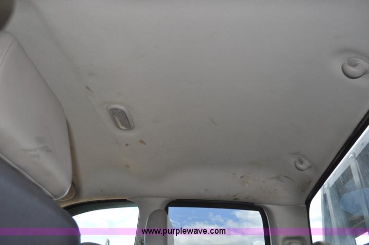 image for item F2352 2007 Dodge Ram 3500 Quad Cab flatbed truck