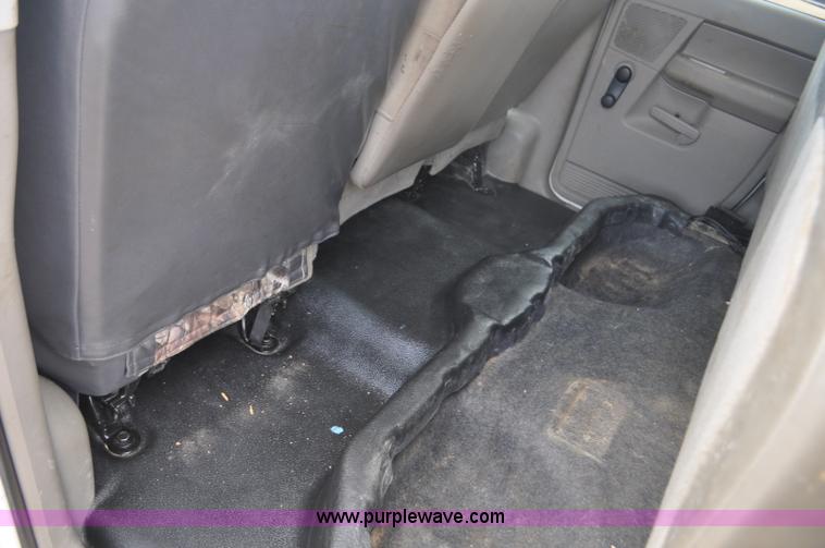 image for item F2352 2007 Dodge Ram 3500 Quad Cab flatbed truck