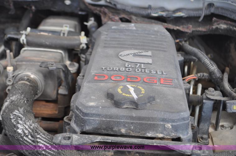 image for item F2352 2007 Dodge Ram 3500 Quad Cab flatbed truck