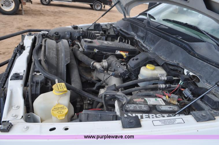 image for item F2352 2007 Dodge Ram 3500 Quad Cab flatbed truck