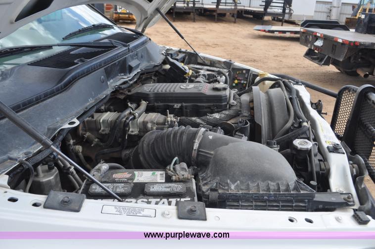 image for item F2352 2007 Dodge Ram 3500 Quad Cab flatbed truck