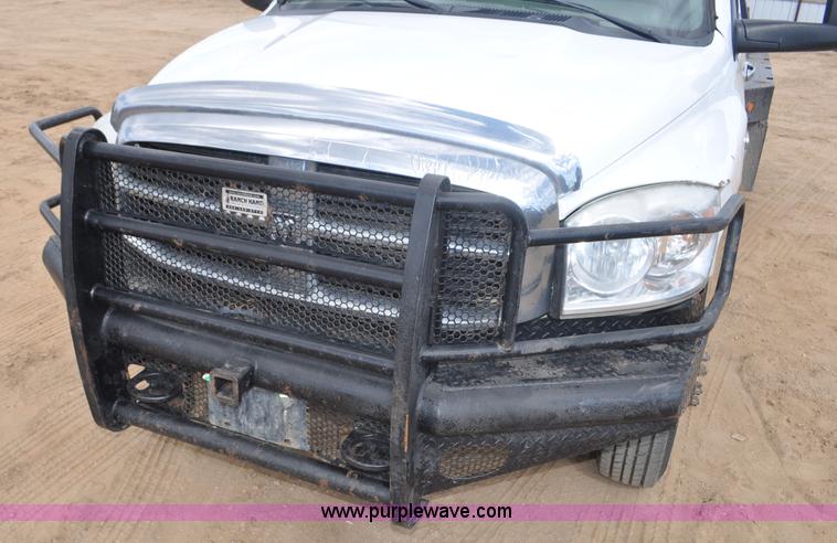 image for item F2352 2007 Dodge Ram 3500 Quad Cab flatbed truck