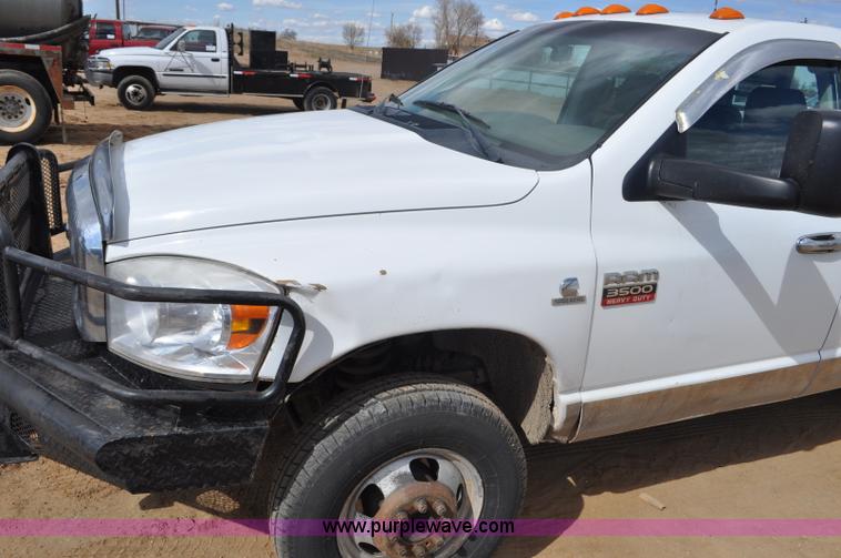 image for item F2352 2007 Dodge Ram 3500 Quad Cab flatbed truck