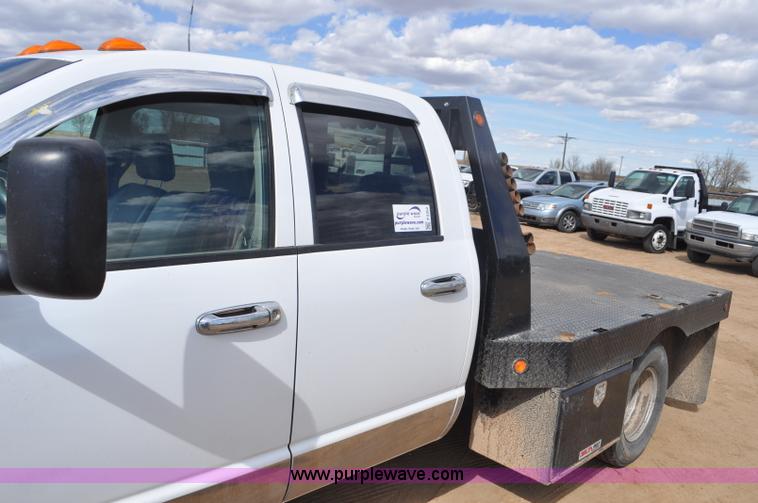 image for item F2352 2007 Dodge Ram 3500 Quad Cab flatbed truck