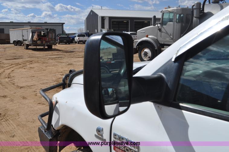 image for item F2352 2007 Dodge Ram 3500 Quad Cab flatbed truck