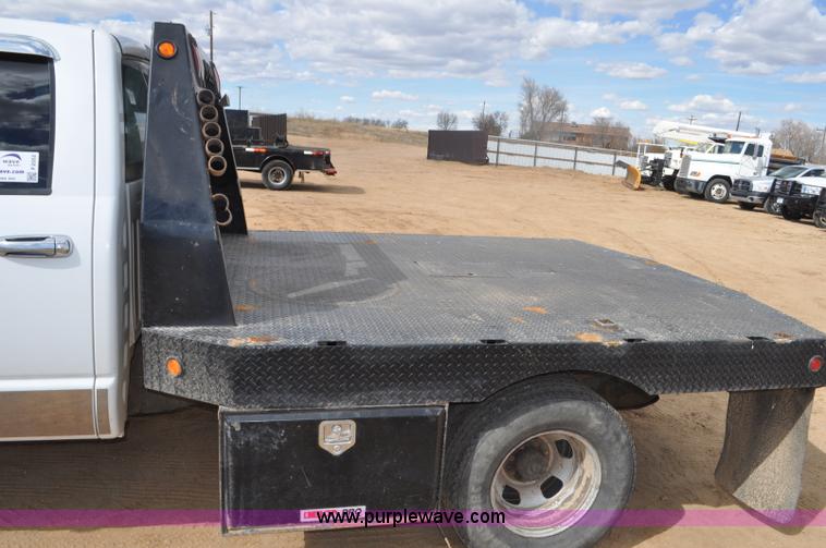 image for item F2352 2007 Dodge Ram 3500 Quad Cab flatbed truck