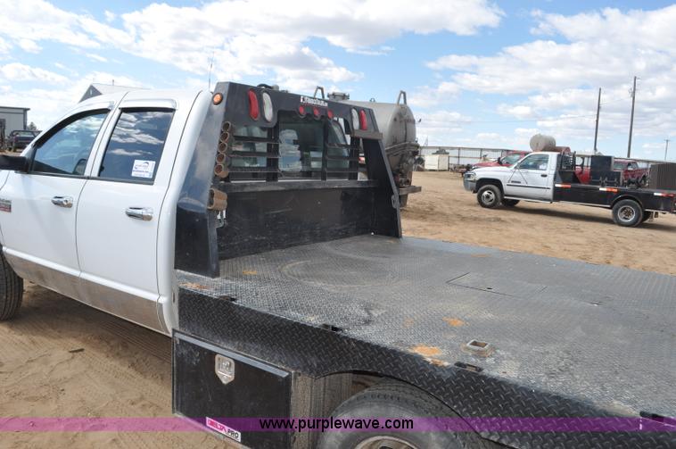 image for item F2352 2007 Dodge Ram 3500 Quad Cab flatbed truck