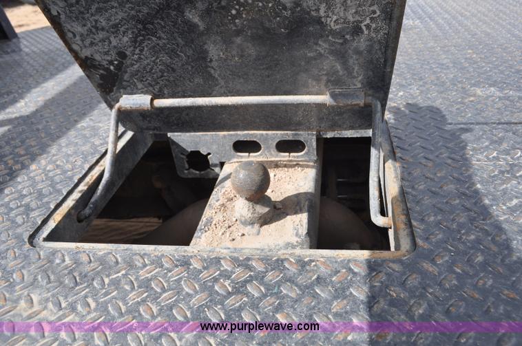 image for item F2352 2007 Dodge Ram 3500 Quad Cab flatbed truck