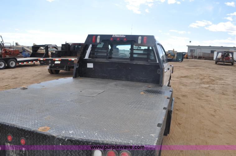image for item F2352 2007 Dodge Ram 3500 Quad Cab flatbed truck