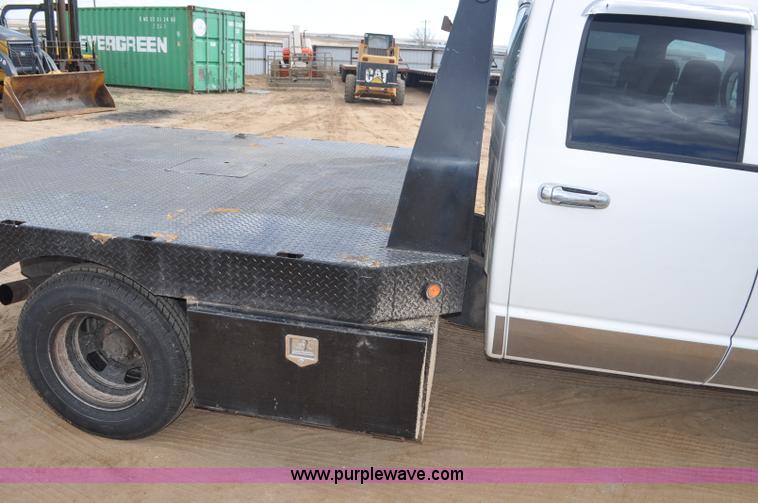 image for item F2352 2007 Dodge Ram 3500 Quad Cab flatbed truck