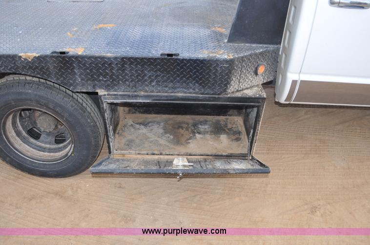image for item F2352 2007 Dodge Ram 3500 Quad Cab flatbed truck
