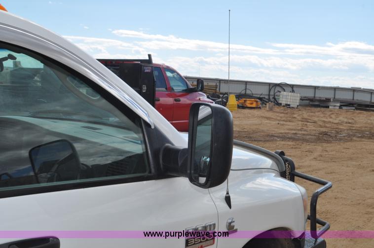 image for item F2352 2007 Dodge Ram 3500 Quad Cab flatbed truck