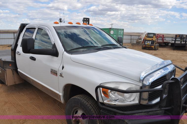 image for item F2352 2007 Dodge Ram 3500 Quad Cab flatbed truck