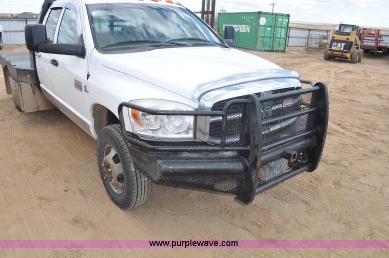 image for item F2352 2007 Dodge Ram 3500 Quad Cab flatbed truck