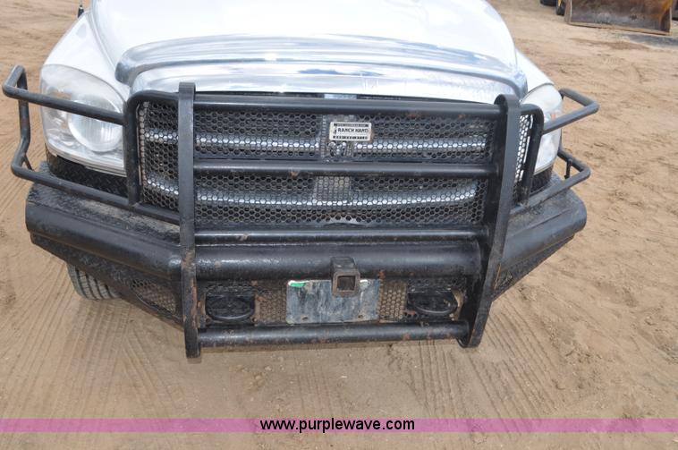 image for item F2352 2007 Dodge Ram 3500 Quad Cab flatbed truck