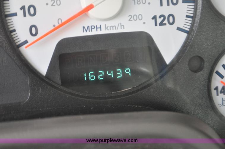 image for item F2352 2007 Dodge Ram 3500 Quad Cab flatbed truck