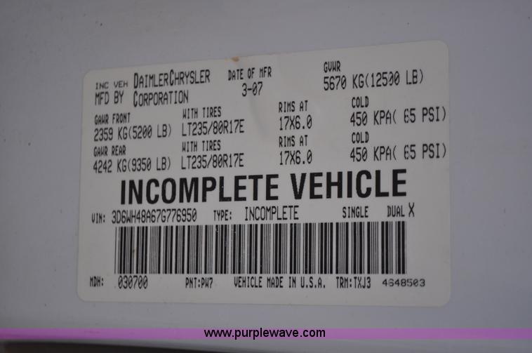 image for item F2352 2007 Dodge Ram 3500 Quad Cab flatbed truck