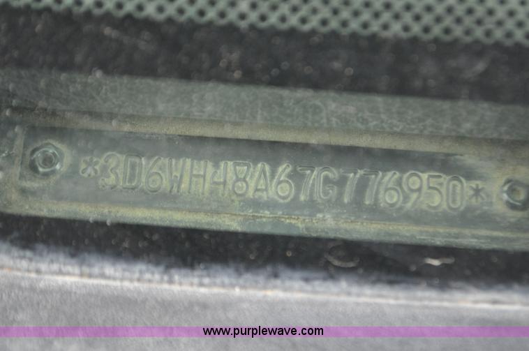 image for item F2352 2007 Dodge Ram 3500 Quad Cab flatbed truck