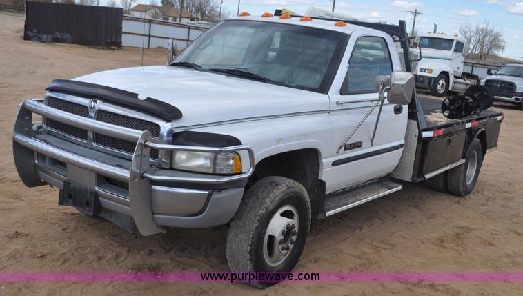 image for item F2353 1999 Dodge Ram 3500 Laramie SLT flatbed truck