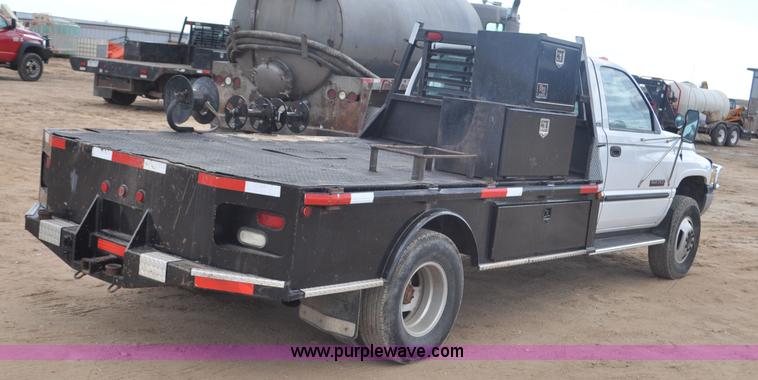 image for item F2353 1999 Dodge Ram 3500 Laramie SLT flatbed truck