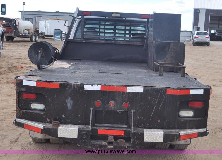image for item F2353 1999 Dodge Ram 3500 Laramie SLT flatbed truck
