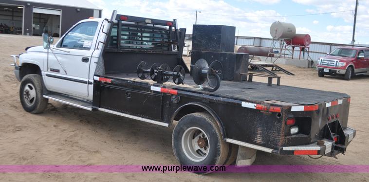 image for item F2353 1999 Dodge Ram 3500 Laramie SLT flatbed truck