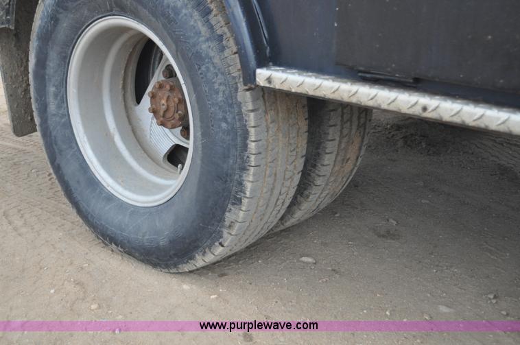 image for item F2353 1999 Dodge Ram 3500 Laramie SLT flatbed truck