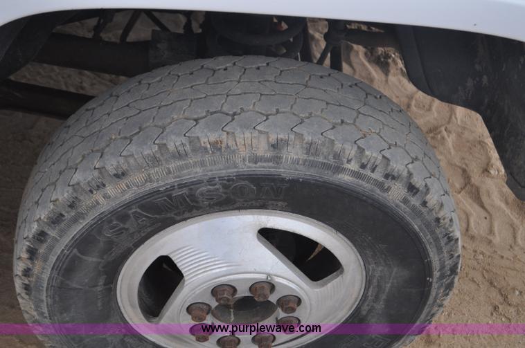 image for item F2353 1999 Dodge Ram 3500 Laramie SLT flatbed truck