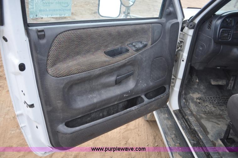 image for item F2353 1999 Dodge Ram 3500 Laramie SLT flatbed truck