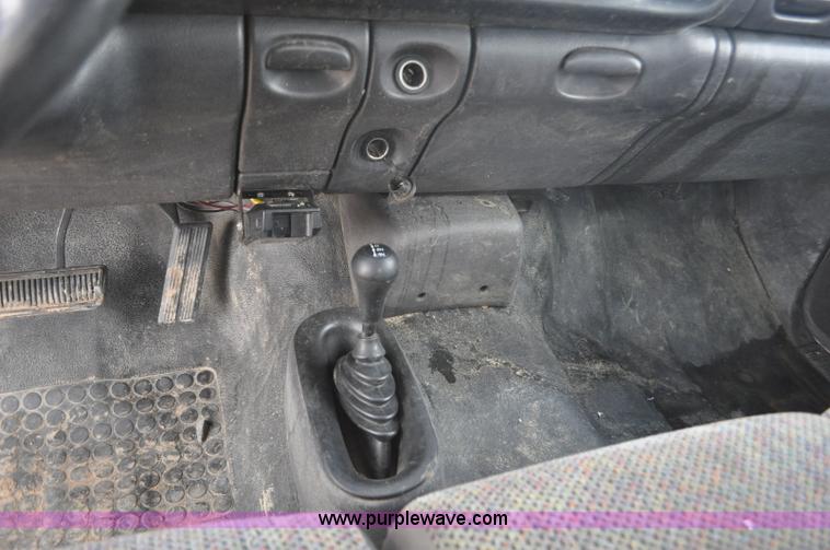 image for item F2353 1999 Dodge Ram 3500 Laramie SLT flatbed truck