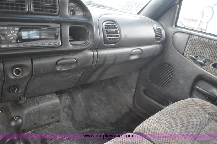 image for item F2353 1999 Dodge Ram 3500 Laramie SLT flatbed truck