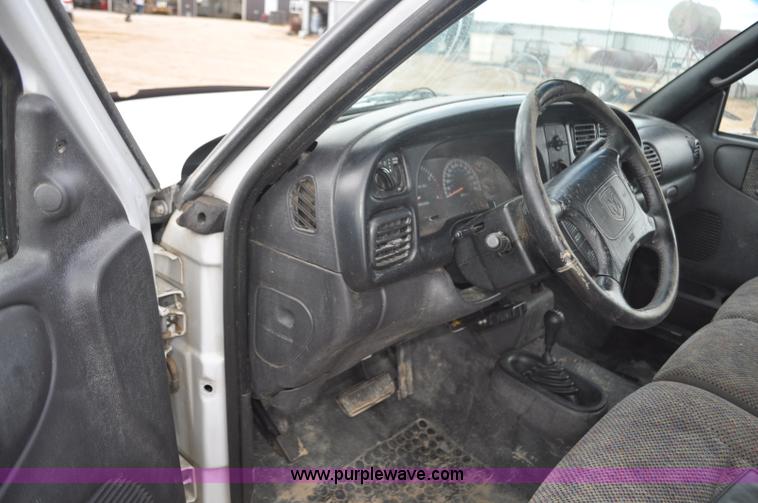 image for item F2353 1999 Dodge Ram 3500 Laramie SLT flatbed truck