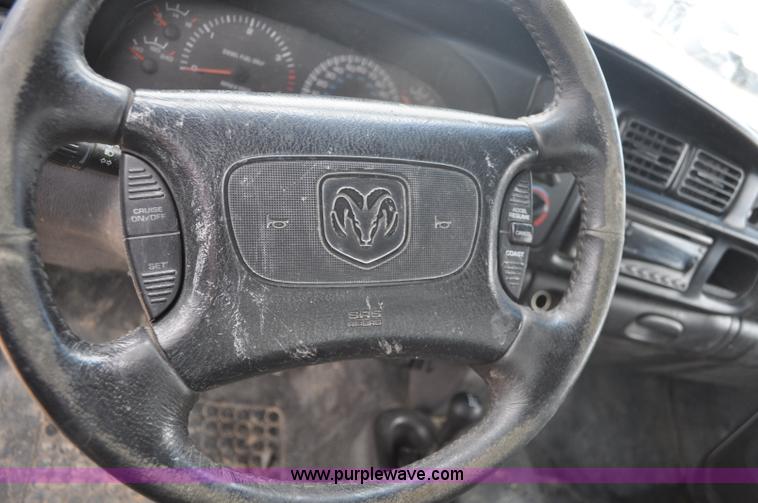 image for item F2353 1999 Dodge Ram 3500 Laramie SLT flatbed truck