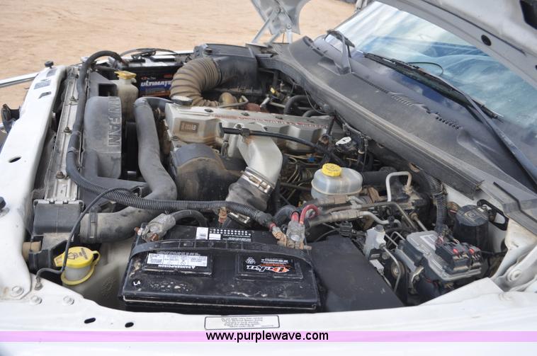 image for item F2353 1999 Dodge Ram 3500 Laramie SLT flatbed truck