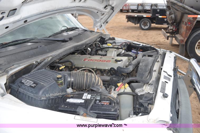 image for item F2353 1999 Dodge Ram 3500 Laramie SLT flatbed truck