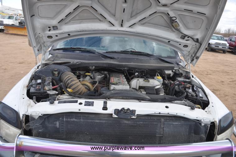 image for item F2353 1999 Dodge Ram 3500 Laramie SLT flatbed truck