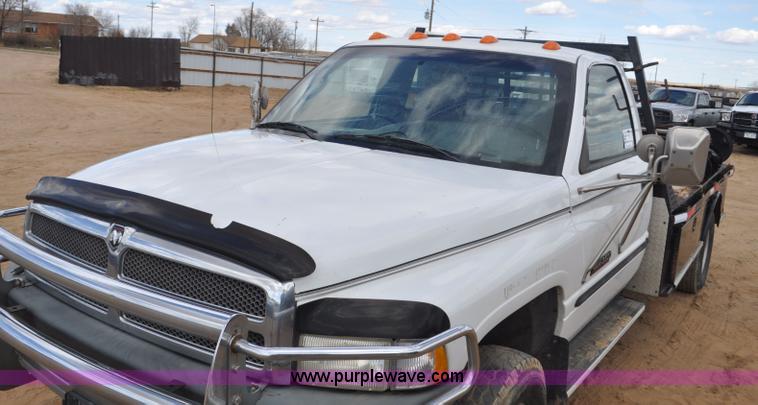 image for item F2353 1999 Dodge Ram 3500 Laramie SLT flatbed truck