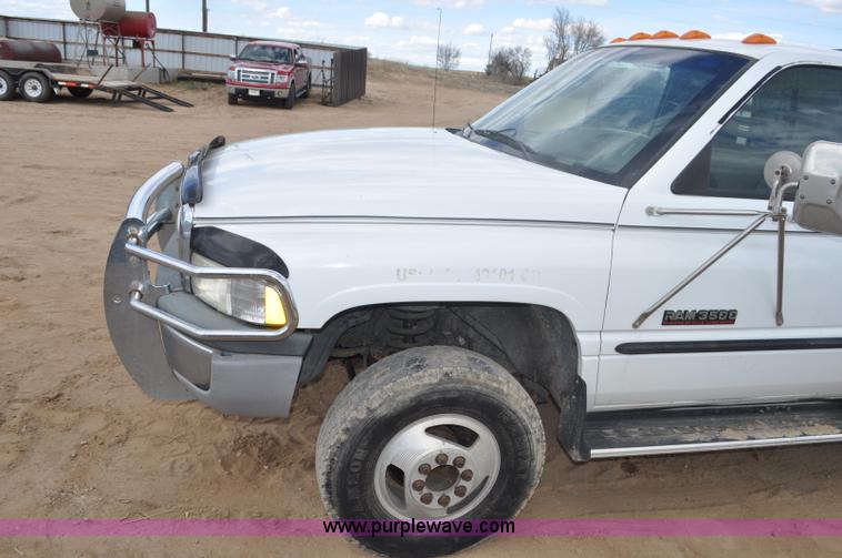 image for item F2353 1999 Dodge Ram 3500 Laramie SLT flatbed truck
