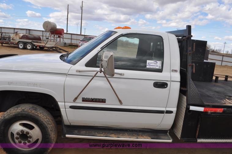 image for item F2353 1999 Dodge Ram 3500 Laramie SLT flatbed truck