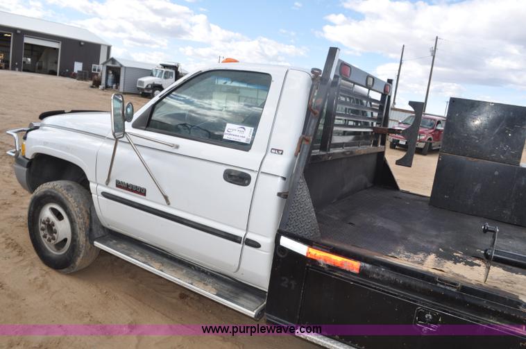 image for item F2353 1999 Dodge Ram 3500 Laramie SLT flatbed truck
