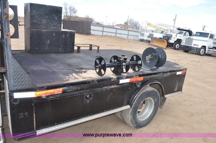 image for item F2353 1999 Dodge Ram 3500 Laramie SLT flatbed truck